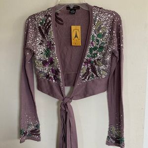 Embellished Vintage wraparound midriff short blouse.